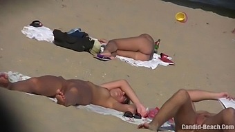 Uninhibited Couples Baring It All In Candid Beach Setting Captured By Hidden Cam